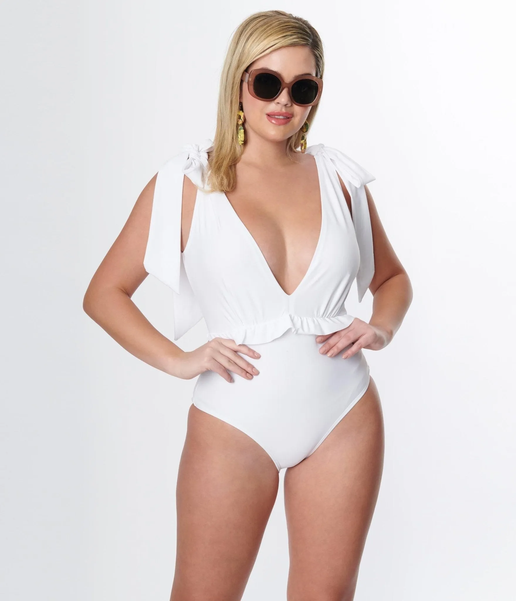 Unique Vintage White Plunge One Piece Swimsuit