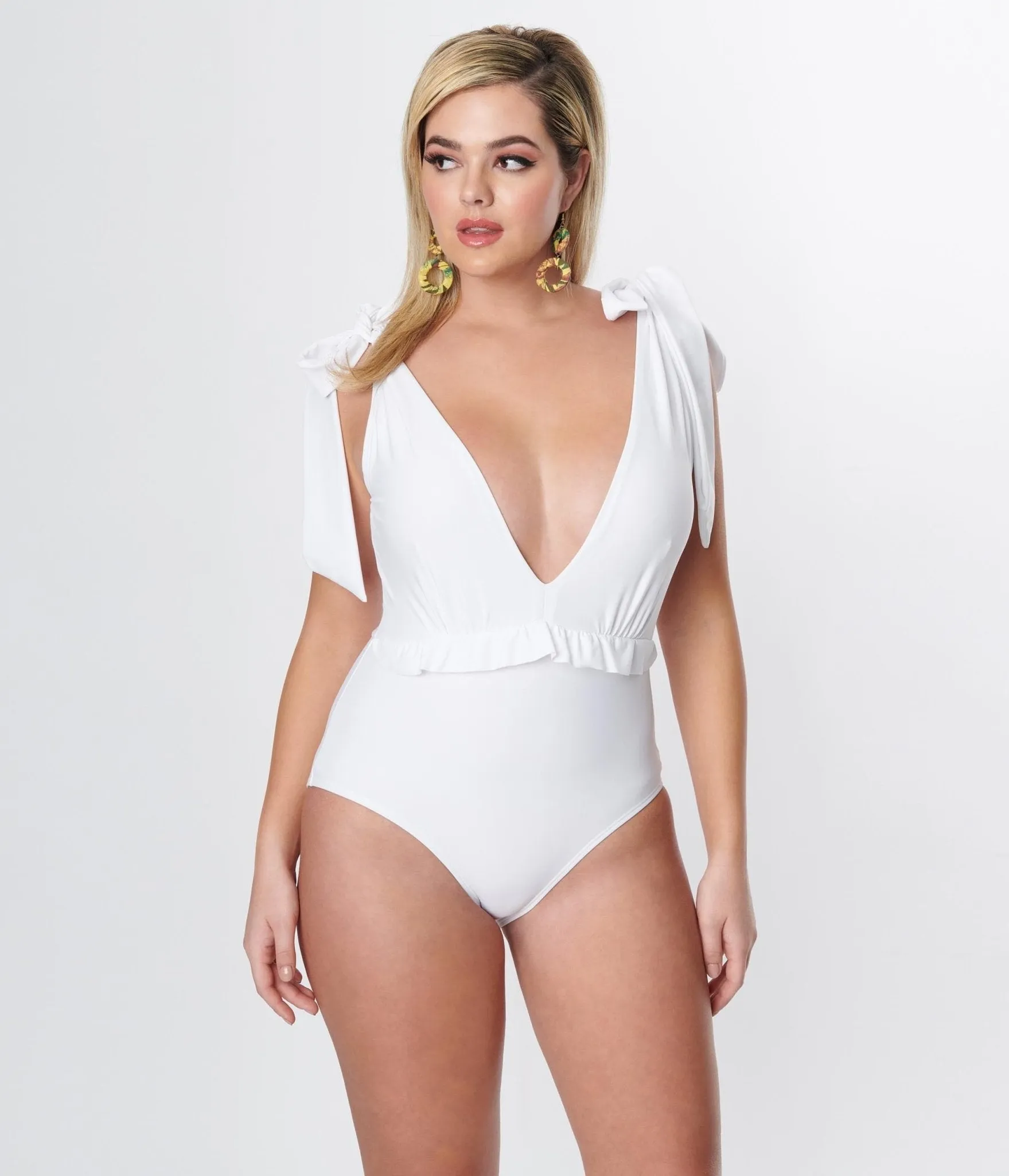 Unique Vintage White Plunge One Piece Swimsuit